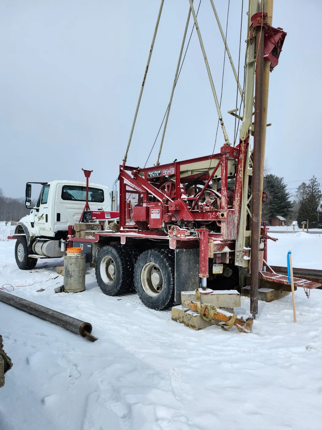 Chatfield well drilling equipment at a winter job site